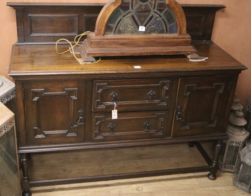 A 1920s Jacobean revival oak sideboard, W.150cm, D.52cm, H.96cm